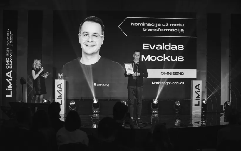 Evaldas Mockus on stage with a microphone